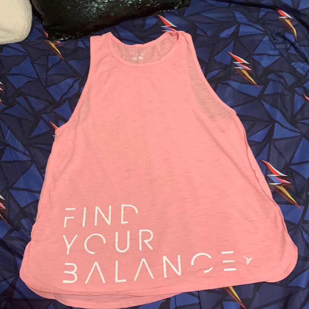 Pink old navy tank top. With “find your balance” writing on the right side.